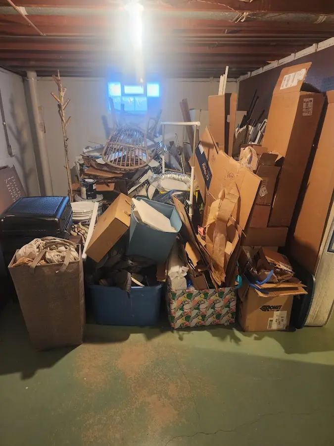 Roll-off dumpster container at job site for Yard Waste Dumpster Rental in St. Marys